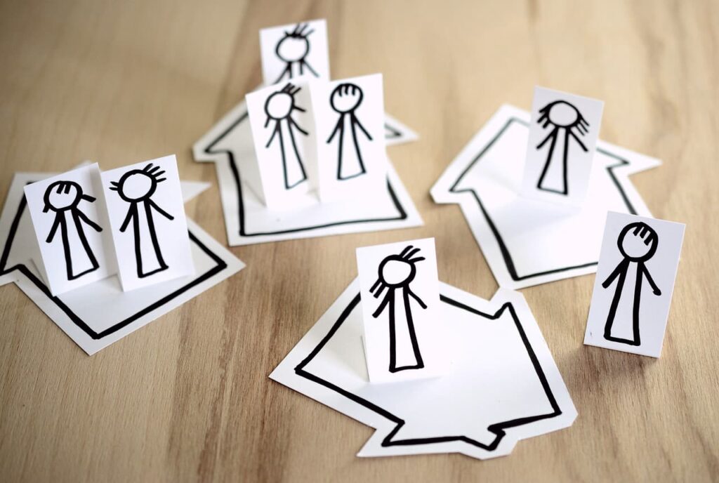 A paper-made arrow with a human-shaped figure